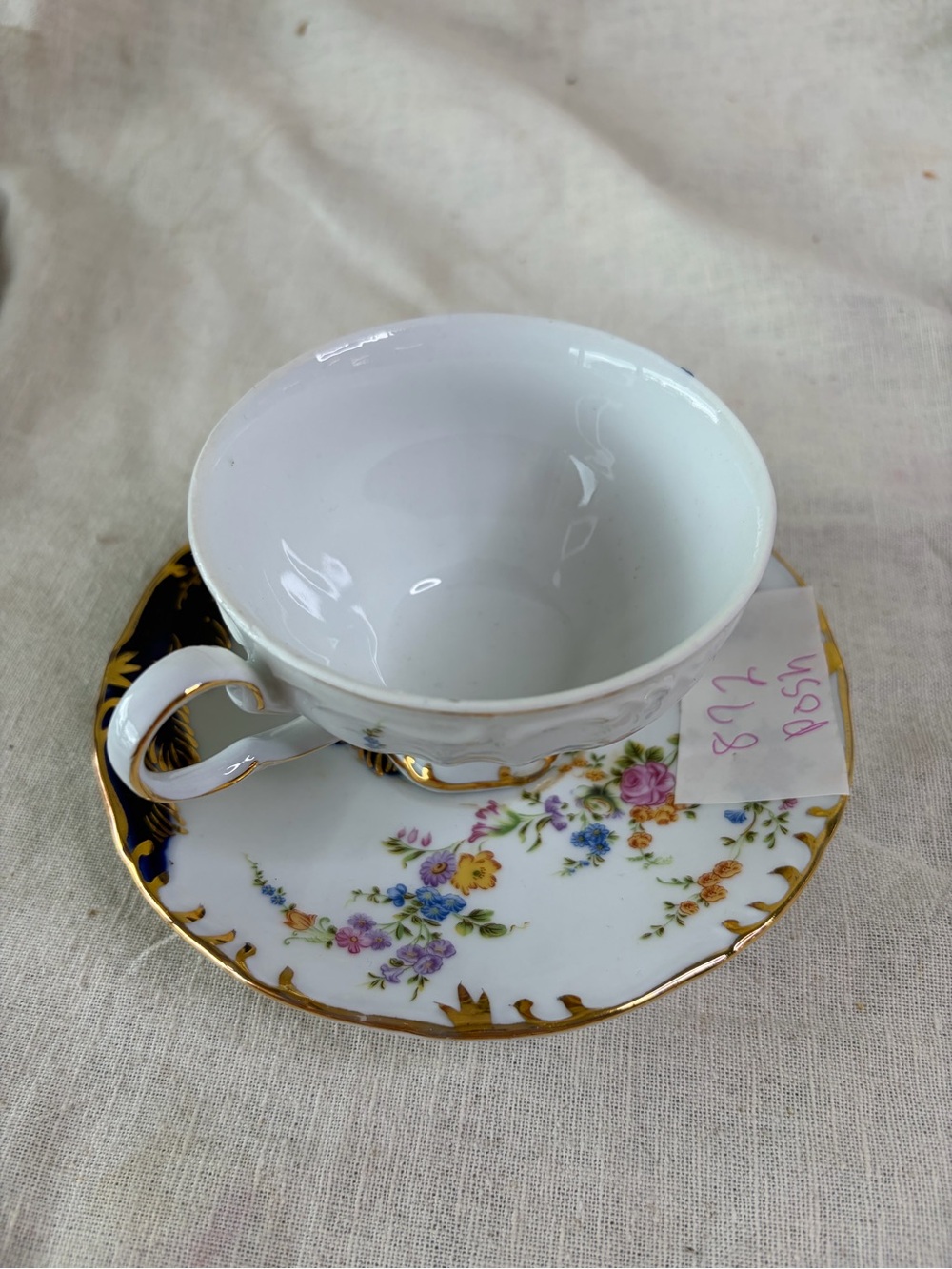 White Floral Porcelain Teacup & Saucer with Gold Trim